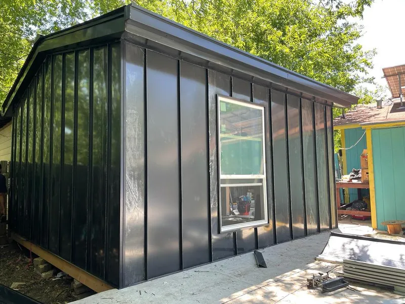 Black standing seam metal wall panels for Roof Inspection in Pasadena Hills