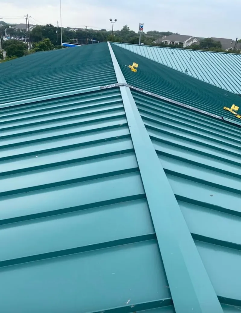 Green commercial metal roof ridge and valley for Metal Roof Repair in Pasadena Hills